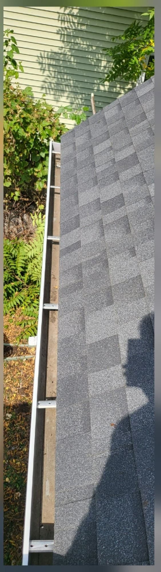Long roofline gutter drop fully cleared after service
