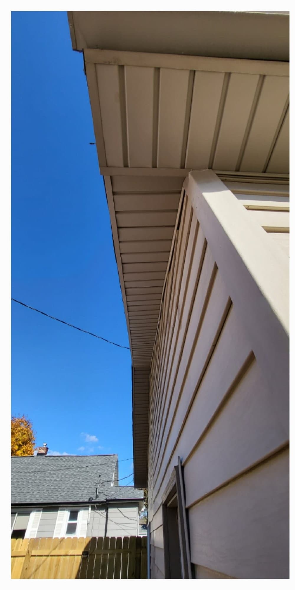 Soffit and fascia with staining before cleaning