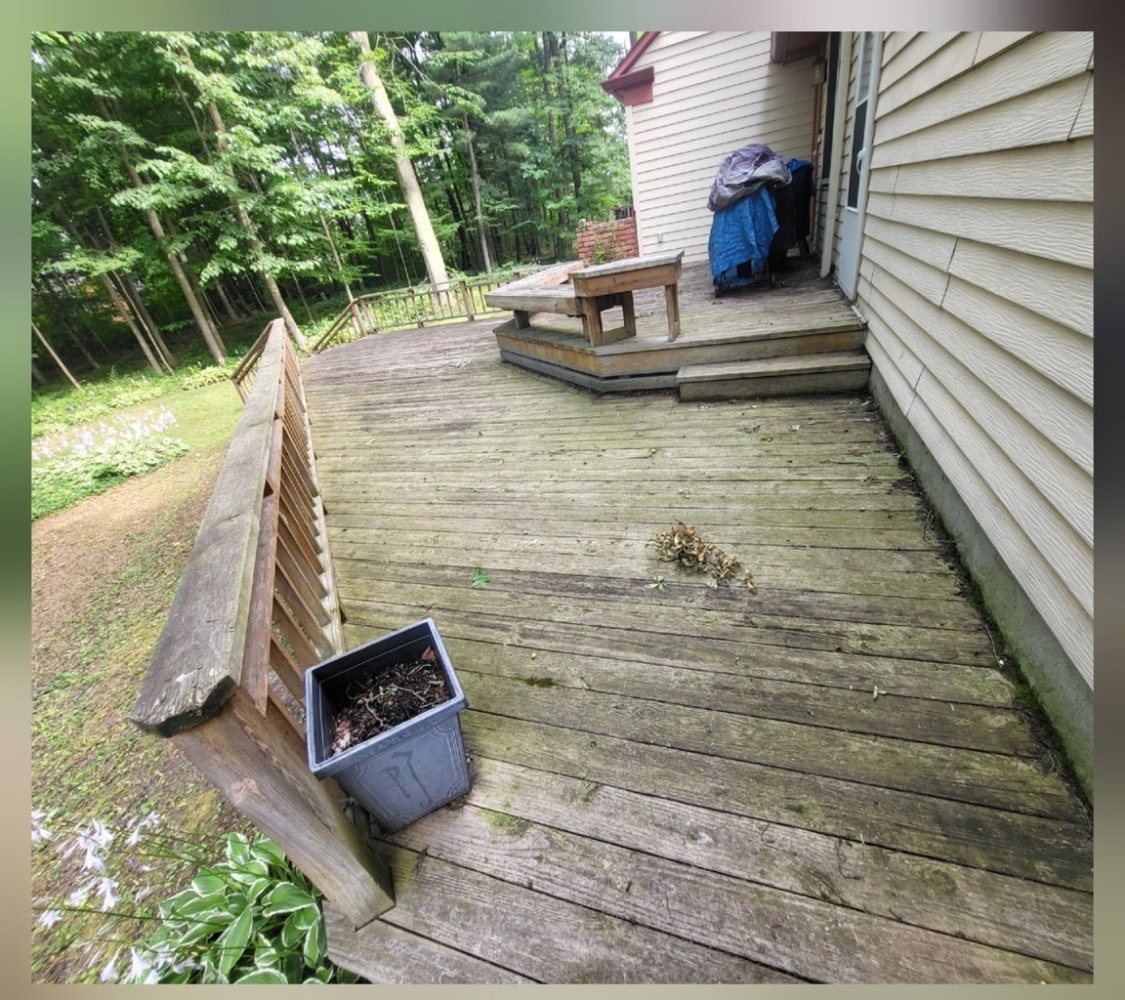 Wood deck surface weathered, gray, and dirty before cleaning