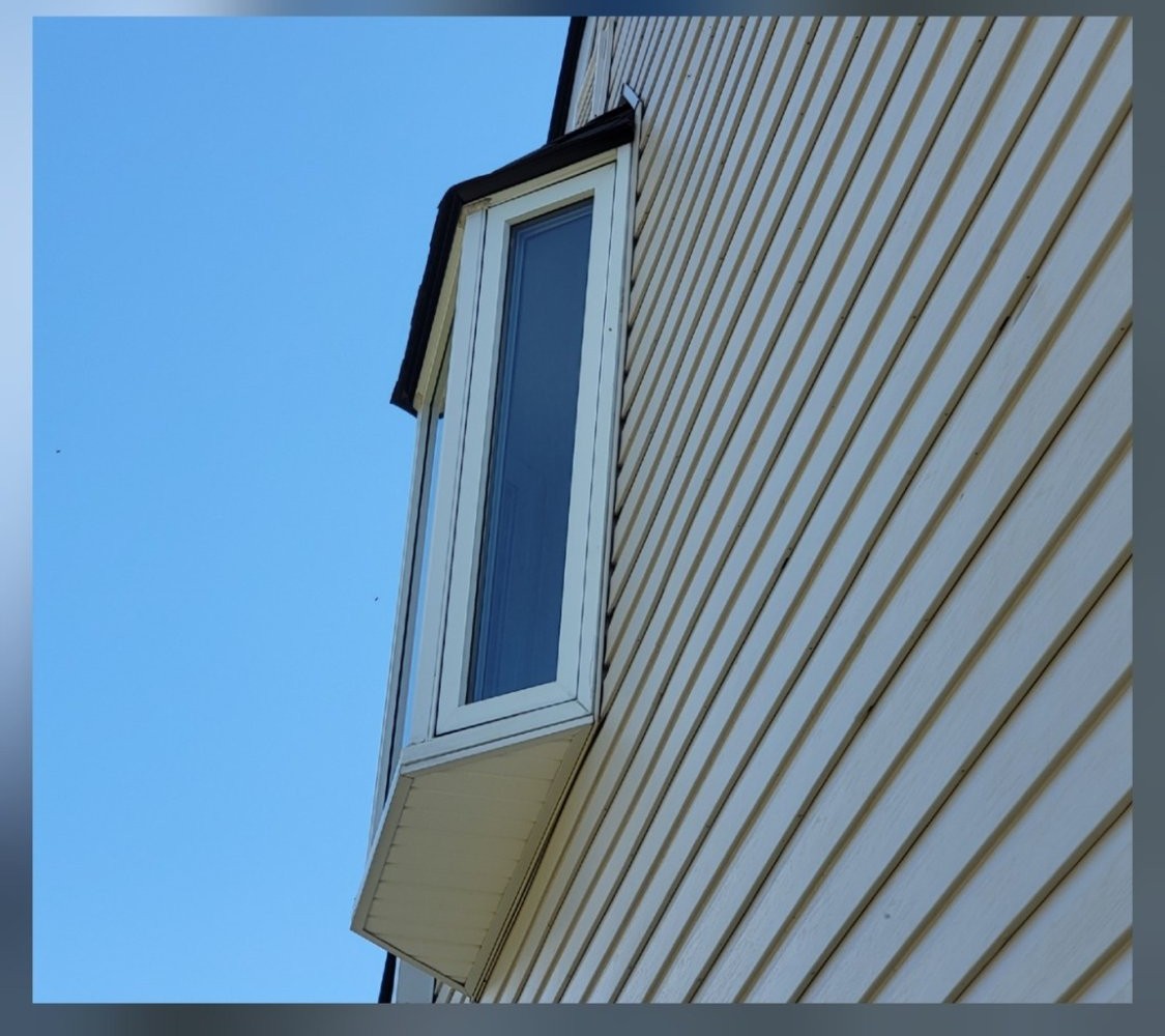 Window and siding detail clean after soft wash
